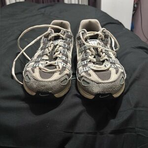 Nike Beige and Gray Athletic Shoes for men. Style is P-6000